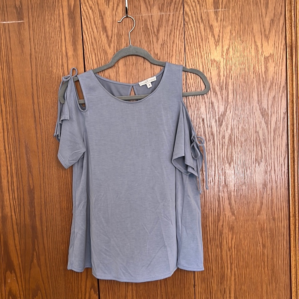 Blue off the shoulder shirt